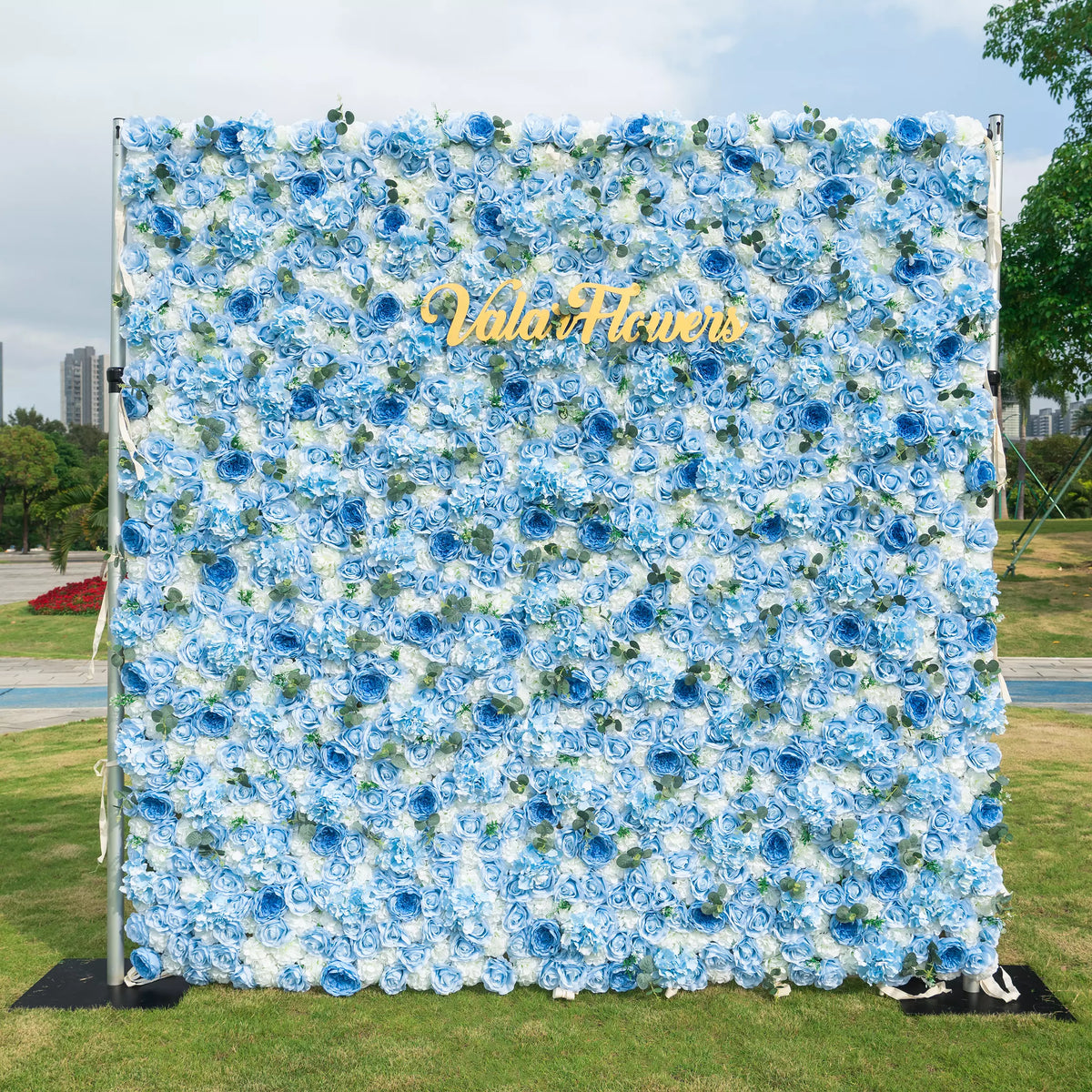 Azure Adoration: An Enchanting Ballet of Mixed Baby Blue and White Green Flower Blooms and Whispering Waves Floral Wall | VF-067