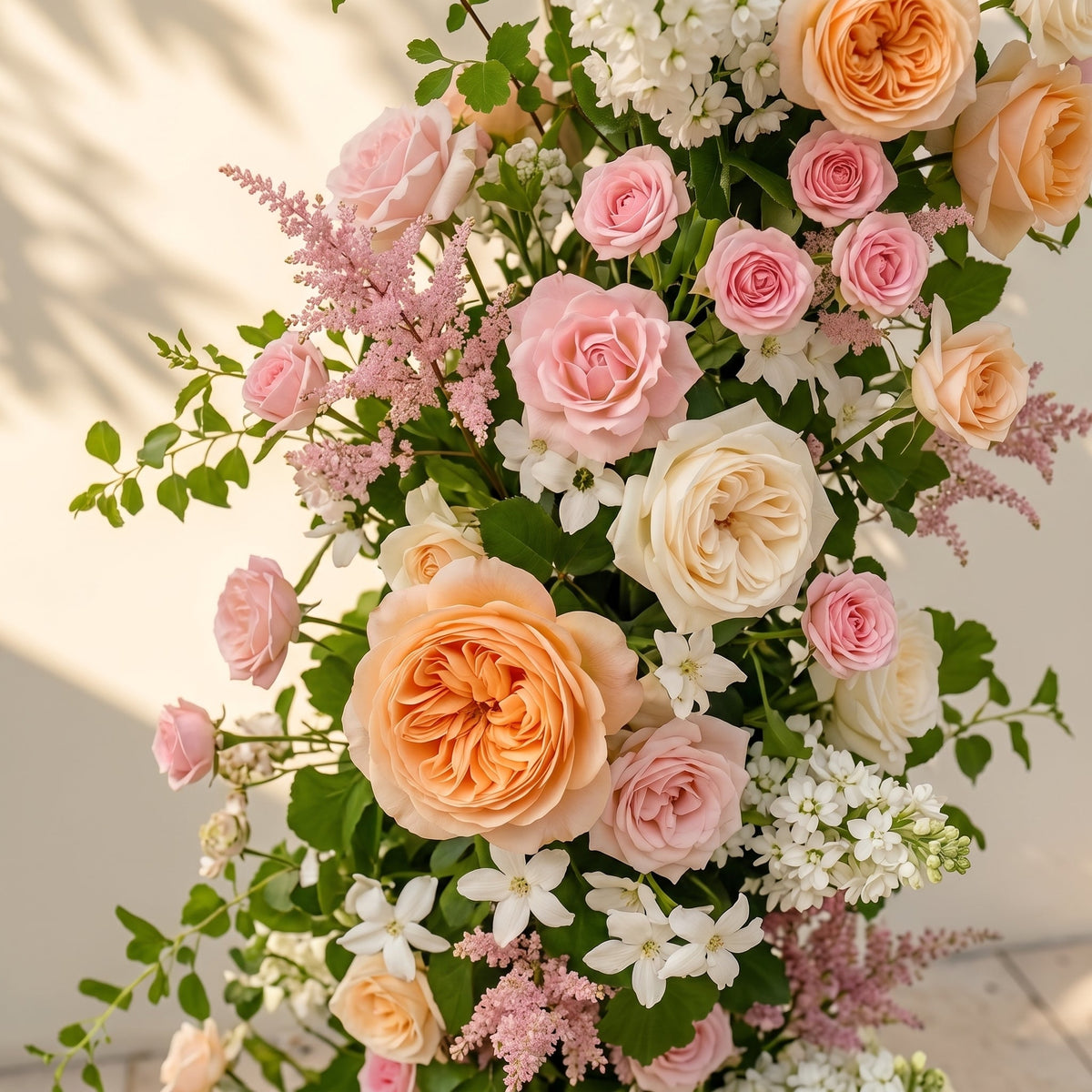 Livyne: Luxury Peach Orange, Ivory White & Blush Pink Silk Floral Ground Horn Arch Arrangement with Soft Astilbe & Lush Cascading Greenery for Romantic Minimalist Weddings & Garden Event Decor Including Frame