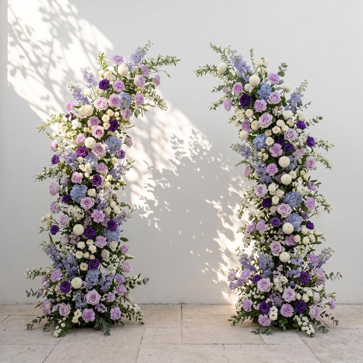 Marmere: Luxury Lavender Purple, Ivory White & Dusty Blue Silk Floral Ground Horn Arch Arrangement with Soft Delphinium & Lush Cascading Greenery for Romantic Minimalist Weddings & Garden Event Decor Including Frame