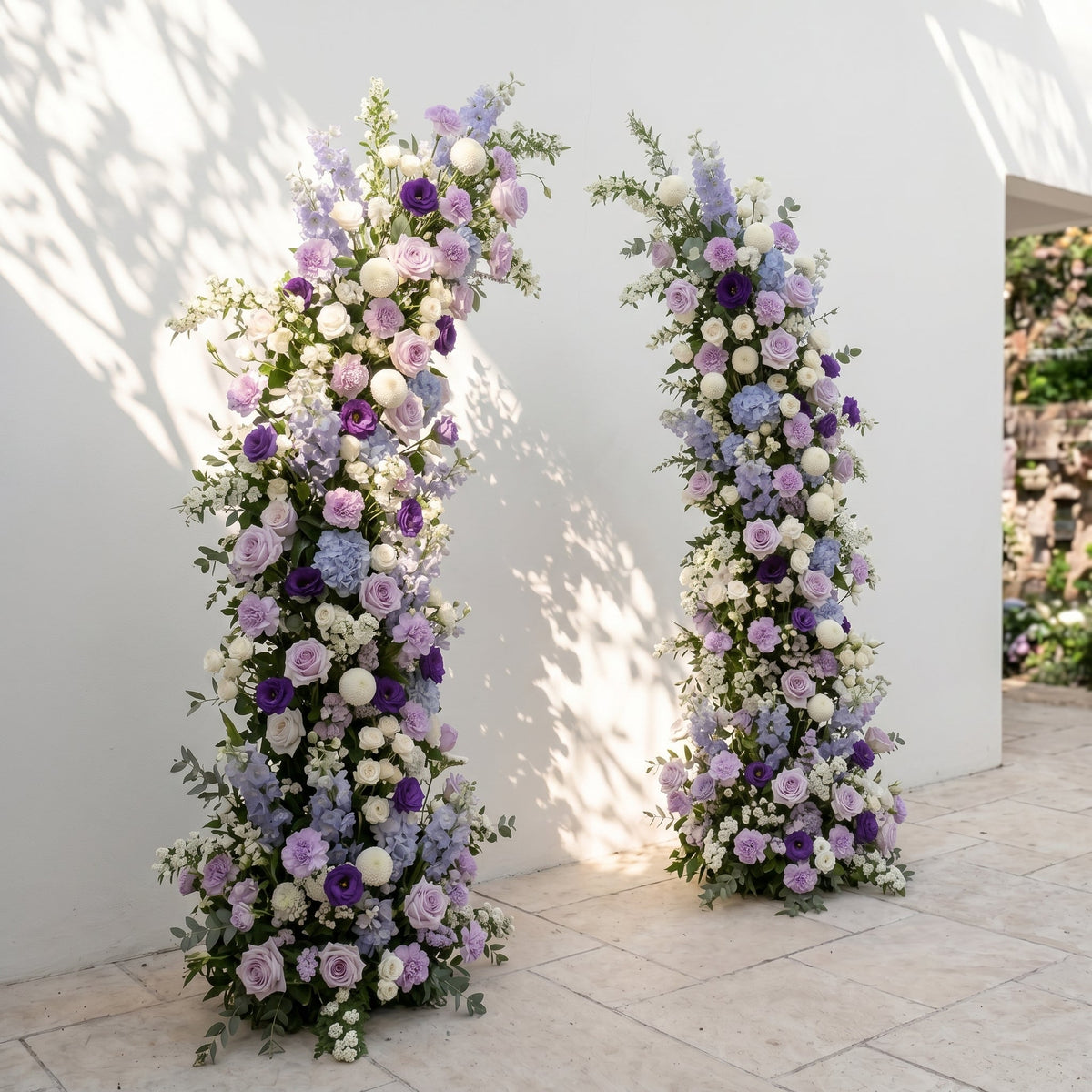 Marmere: Luxury Lavender Purple, Ivory White & Dusty Blue Silk Floral Ground Horn Arch Arrangement with Soft Delphinium & Lush Cascading Greenery for Romantic Minimalist Weddings & Garden Event Decor Including Frame