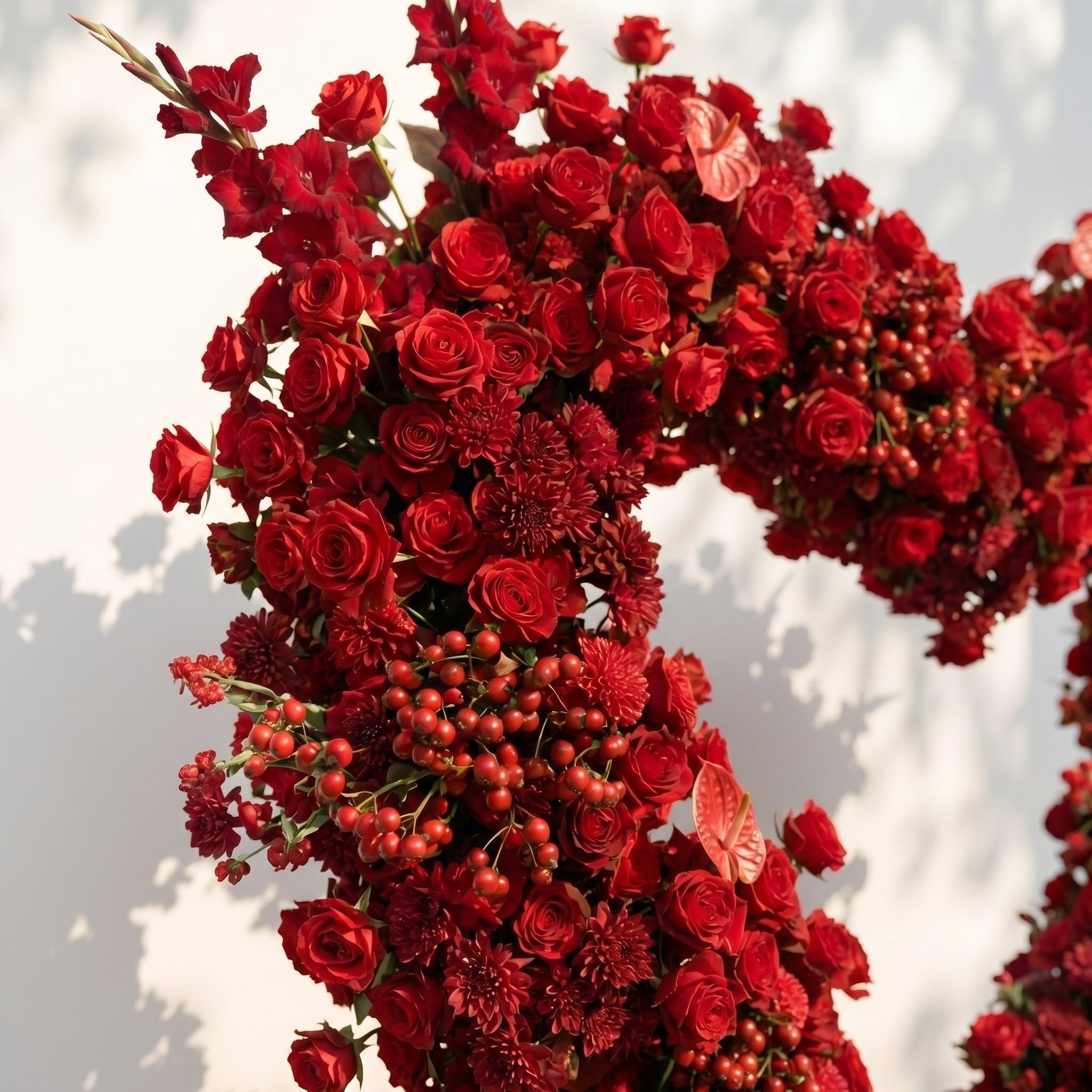 Novira: Heart-Shaped Red Floral Silk Flower Arch Floral Arrangement for Boho Weddings