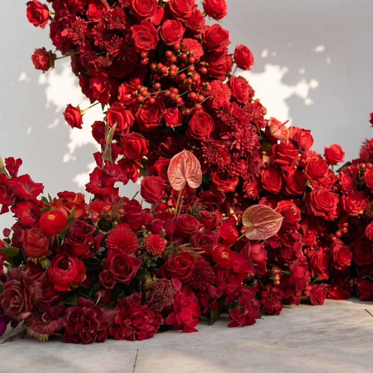 Novira: Heart-Shaped Red Floral Silk Flower Arch Floral Arrangement for Boho Weddings