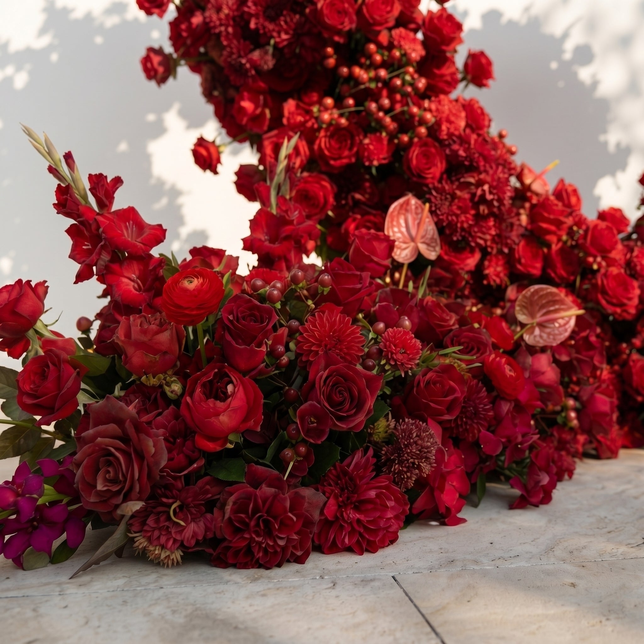 Novira: Heart-Shaped Red Floral Silk Flower Arch Floral Arrangement for Boho Weddings