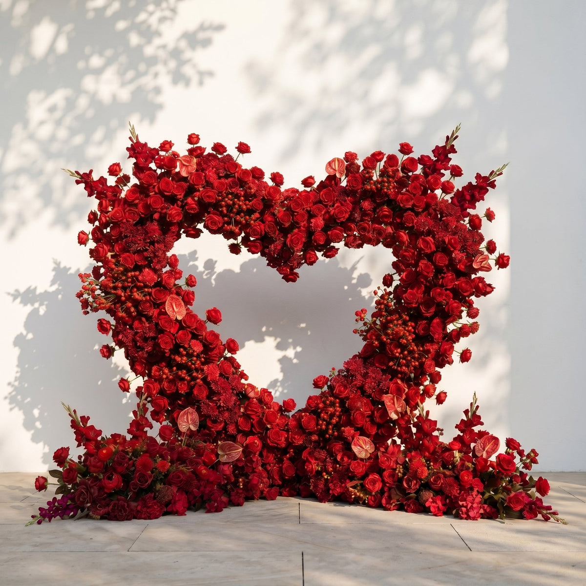 Novira: Heart-Shaped Red Floral Silk Flower Arch Floral Arrangement for Boho Weddings
