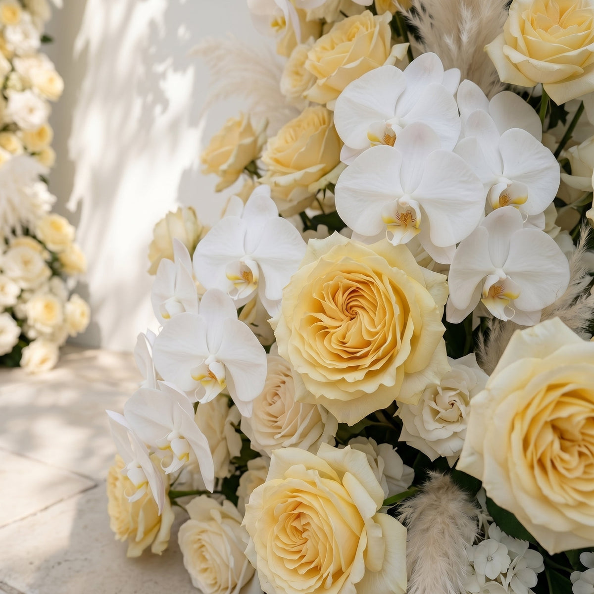 Orelrose: Luxury Soft Yellow Cream, Pure White & Ivory Silk Floral Ground Horn Arch Arrangement with Soft Pampas Grass & Lush Cascading Greenery for Romantic Minimalist Weddings & Garden Event Decor Including Frame