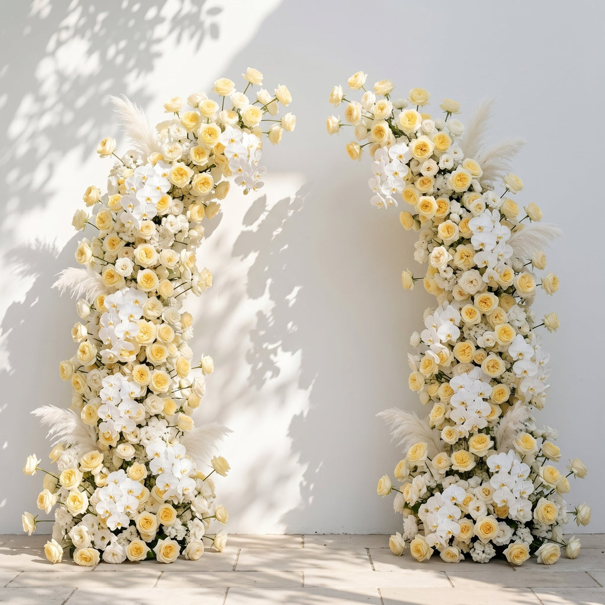 Orelrose: Luxury Soft Yellow Cream, Pure White & Ivory Silk Floral Ground Horn Arch Arrangement with Soft Pampas Grass & Lush Cascading Greenery for Romantic Minimalist Weddings & Garden Event Decor Including Frame