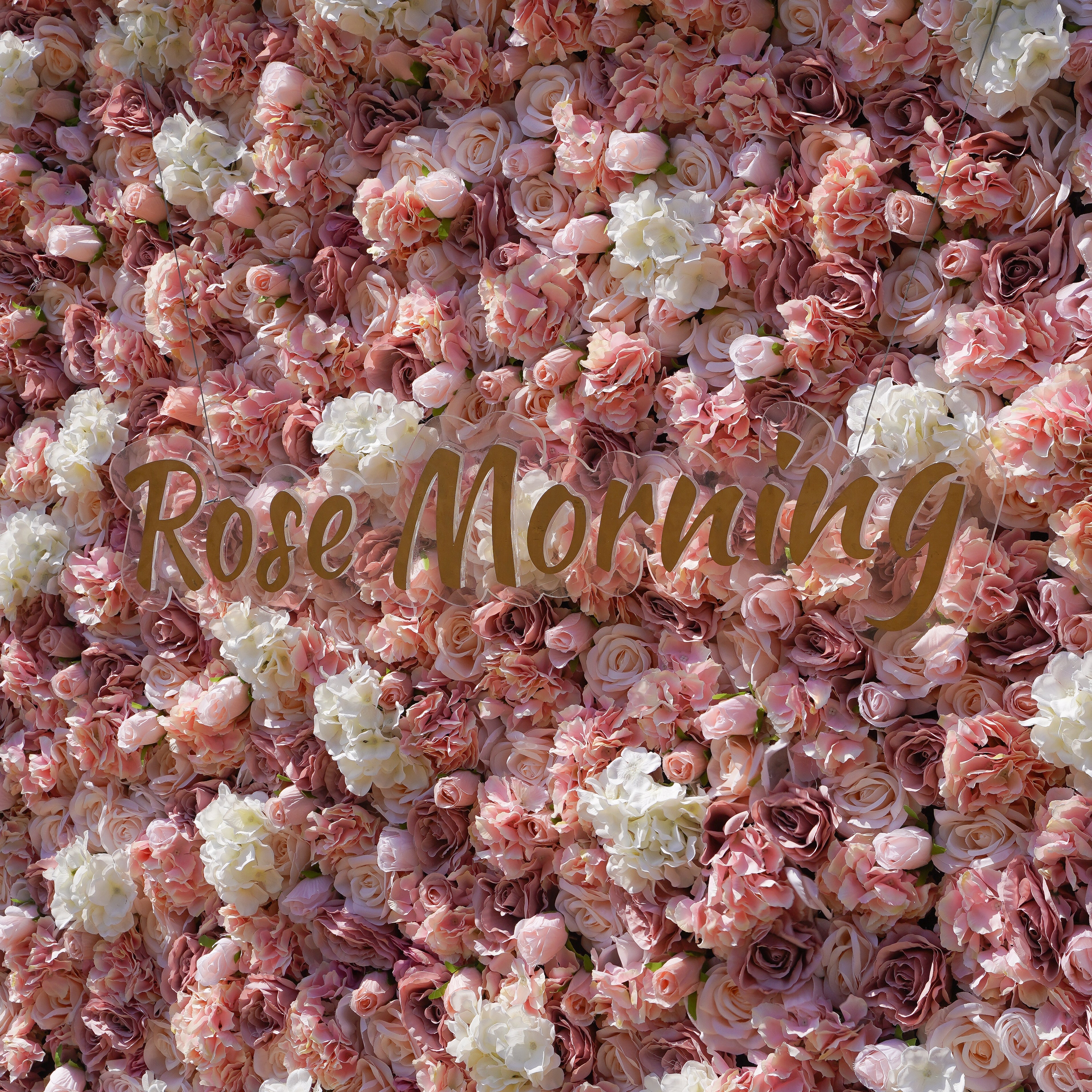 Rose Morning“The flower walls are made of artificial flowers in various colors, layered at different levels to create a lush, elegant and natural look. The exclusive zipper design and roll-up design make it easy to install and remove.”