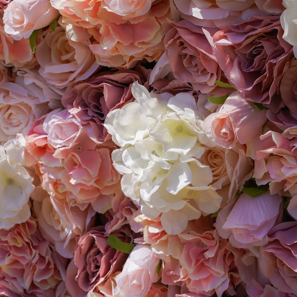Rose Morning“The flower walls are made of artificial flowers in various colors, layered at different levels to create a lush, elegant and natural look. The exclusive zipper design and roll-up design make it easy to install and remove.”